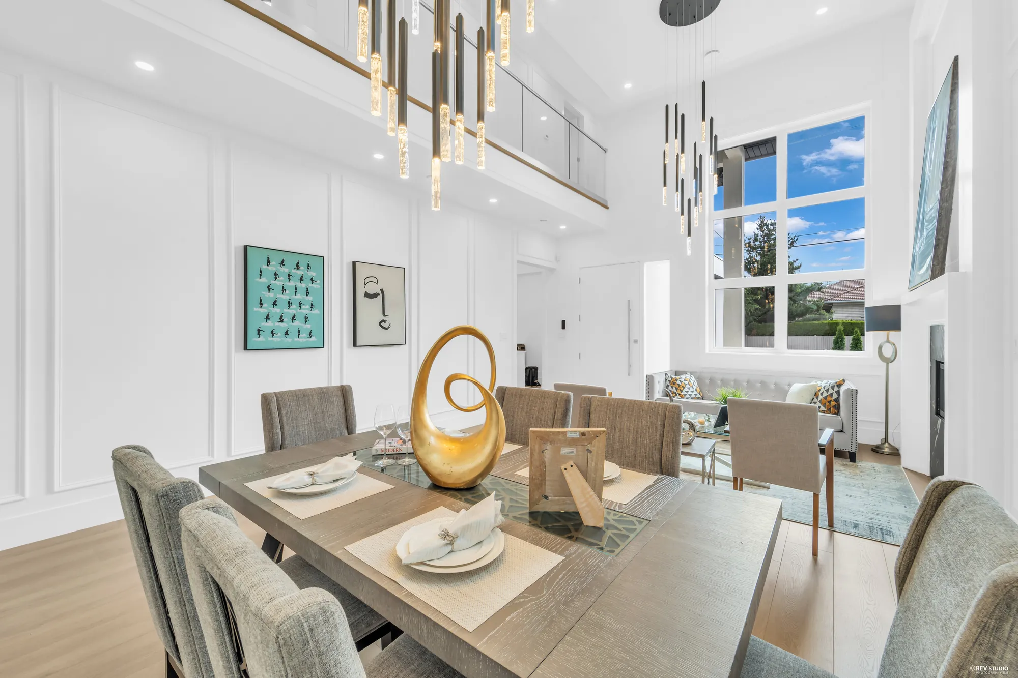 Close on the table and chairs under the pendant cluster